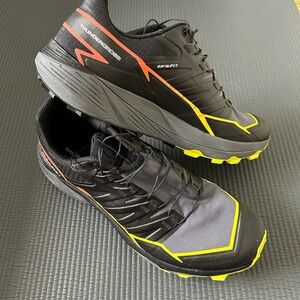 Salomon Men’s Black Trail Running Shoes with Yellow and Orange Accents